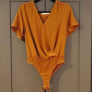 LUSH Front Wrap Flutter Sleeve Bodysuit